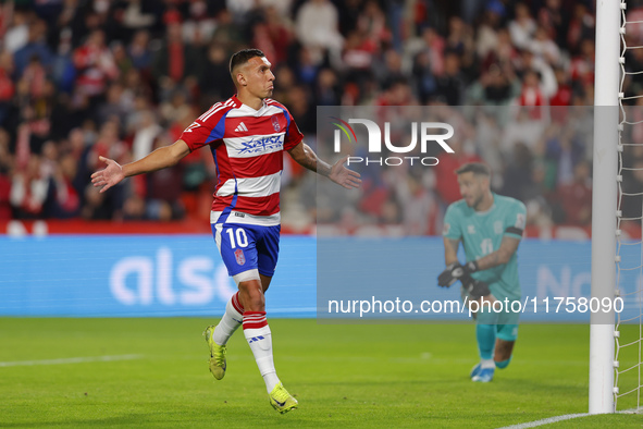 Myrto Uzuni of Granada CF scores the first goal of the match from the penalty during the LaLiga Hypermotion match between Granada CF and CD...