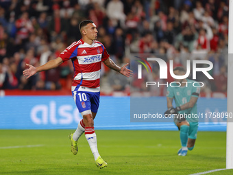 Myrto Uzuni of Granada CF scores the first goal of the match from the penalty during the LaLiga Hypermotion match between Granada CF and CD...