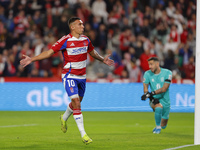 Myrto Uzuni of Granada CF scores the first goal of the match from the penalty during the LaLiga Hypermotion match between Granada CF and CD...