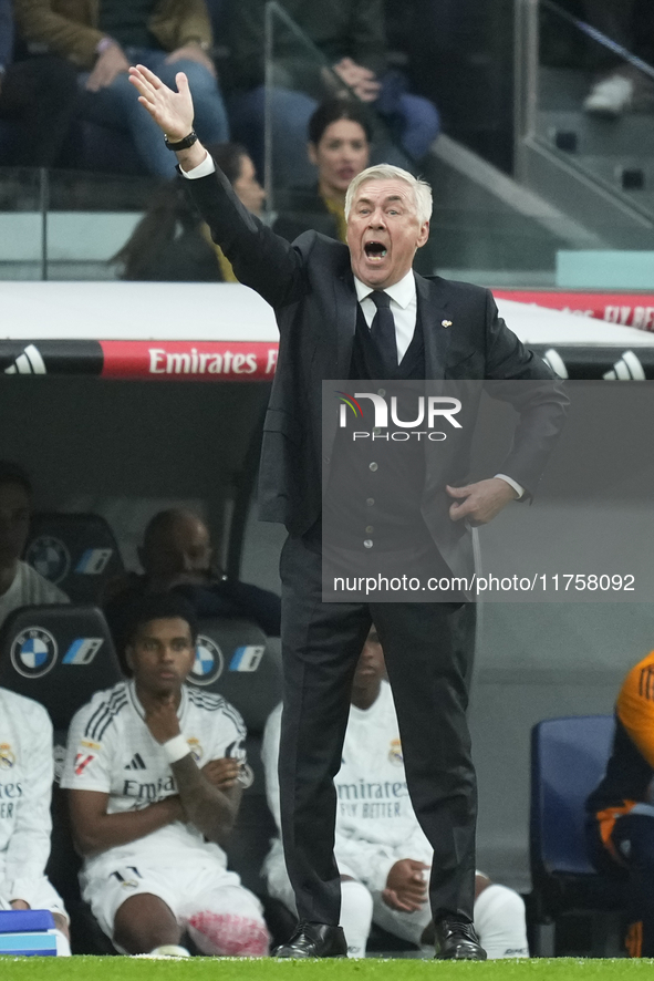 Carlo Ancelotti head coach of Real Madrid gives instructions during the La Liga match between Real Madrid CF and CA Osasuna at Estadio Santi...