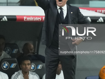 Carlo Ancelotti head coach of Real Madrid gives instructions during the La Liga match between Real Madrid CF and CA Osasuna at Estadio Santi...