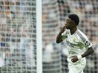 Vinicius Junior left winger of Real Madrid and Brazil celebrates after scoring his sides first goal during the La Liga match between Real Ma...