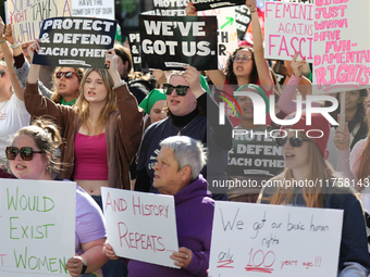 Pro-choice demonstrators protest outside of The Heritage Foundation in Washington, D.C. on November 9, 2024 following the re-election of for...