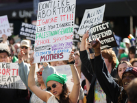 Pro-choice demonstrators protest outside of The Heritage Foundation in Washington, D.C. on November 9, 2024 following the re-election of for...