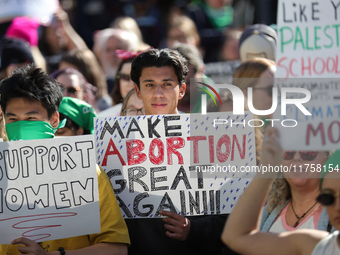 Pro-choice demonstrators protest outside of The Heritage Foundation in Washington, D.C. on November 9, 2024 following the re-election of for...