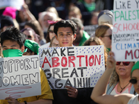 Pro-choice demonstrators protest outside of The Heritage Foundation in Washington, D.C. on November 9, 2024 following the re-election of for...