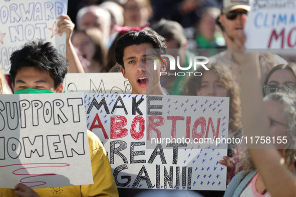 Pro-choice demonstrators protest outside of The Heritage Foundation in Washington, D.C. on November 9, 2024 following the re-election of for...