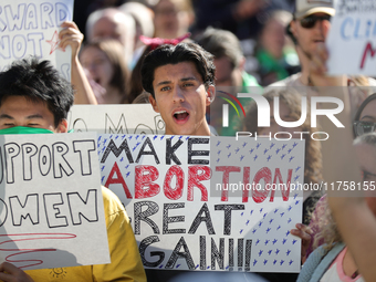 Pro-choice demonstrators protest outside of The Heritage Foundation in Washington, D.C. on November 9, 2024 following the re-election of for...