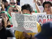 Pro-choice demonstrators protest outside of The Heritage Foundation in Washington, D.C. on November 9, 2024 following the re-election of for...