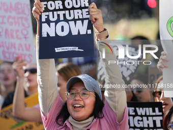 Pro-choice demonstrators protest outside of The Heritage Foundation in Washington, D.C. on November 9, 2024 following the re-election of for...