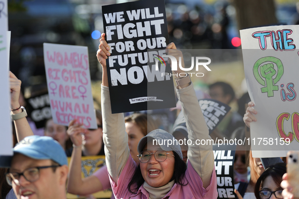 Pro-choice demonstrators protest outside of The Heritage Foundation in Washington, D.C. on November 9, 2024 following the re-election of for...