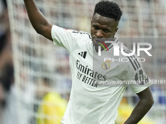 Vinicius Junior left winger of Real Madrid and Brazil celebrates after scoring his sides first goal during the La Liga match between Real Ma...