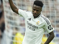 Vinicius Junior left winger of Real Madrid and Brazil celebrates after scoring his sides first goal during the La Liga match between Real Ma...