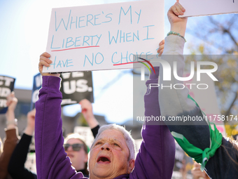 Pro-choice demonstrators protest outside of The Heritage Foundation in Washington, D.C. on November 9, 2024 following the re-election of for...