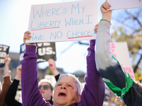 Pro-choice demonstrators protest outside of The Heritage Foundation in Washington, D.C. on November 9, 2024 following the re-election of for...