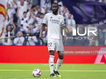 Antonio Rudiger of Real Madrid CF is in action with the ball during the La Liga EA Sports 2024/25 football match between Real Madrid CF and...