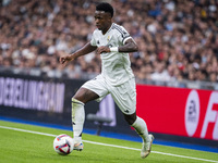 Vinicius Junior of Real Madrid CF is in action with the ball during the La Liga EA Sports 2024/25 football match between Real Madrid CF and...