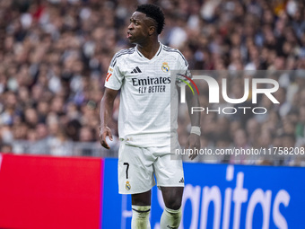 Vinicius Junior of Real Madrid CF protests during the La Liga EA Sports 2024/25 football match between Real Madrid CF and CA Osasuna at Esta...