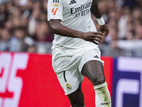 Vinicius Junior of Real Madrid CF is in action with the ball during the La Liga EA Sports 2024/25 football match between Real Madrid CF and...