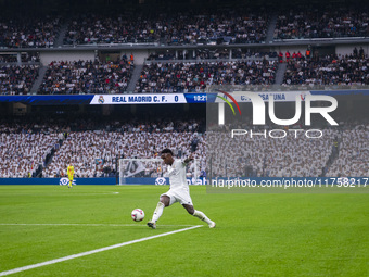 Vinicius Junior of Real Madrid CF is in action with the ball during the La Liga EA Sports 2024/25 football match between Real Madrid CF and...