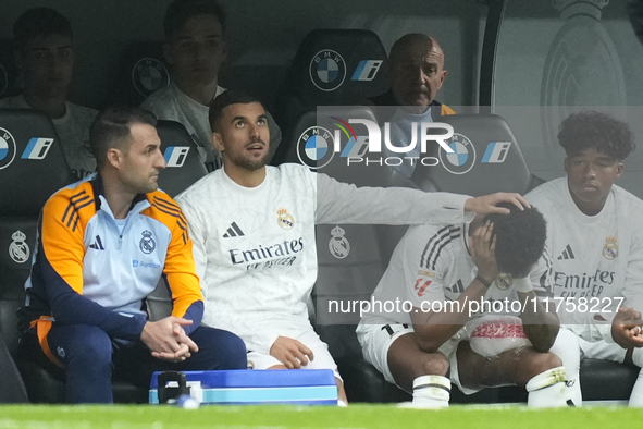 Rodrygo Goes right winger of Real Madrid and Brazil sitting on the bench dejected after his injury during the La Liga match between Real Mad...