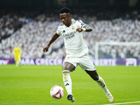 Vinicius Junior left winger of Real Madrid and Brazil controls the ball during the La Liga match between Real Madrid CF and CA Osasuna at Es...