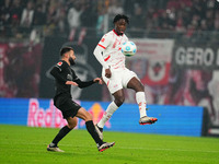 El Chadaille Bitshiabu of Leipzig  controls the ball during the Bundesliga match between RB Leipzig and Borussia Mönchengladbach at Red Bull...