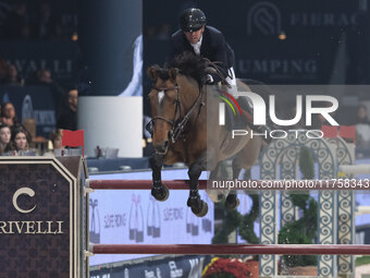 Simon Delestre rides Olga Van de Kruishoeve during the International Winning Round CSI5*-W Trophy No. 5 presented by Crivelli at Jumping Ver...