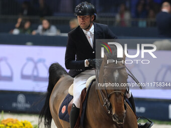 Simon Delestre rides Olga Van de Kruishoeve during the International Winning Round CSI5*-W Trophy No. 5 presented by Crivelli at Jumping Ver...