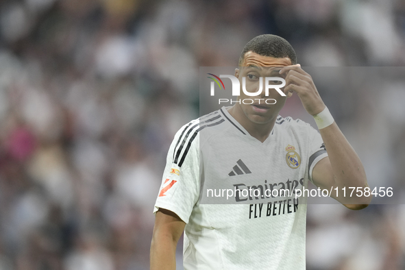 Kylian Mbappe centre-forward of Real Madrid and France reacts during the La Liga match between Real Madrid CF and CA Osasuna at Estadio Sant...