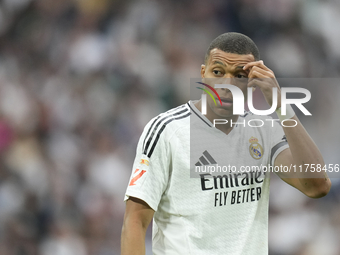 Kylian Mbappe centre-forward of Real Madrid and France reacts during the La Liga match between Real Madrid CF and CA Osasuna at Estadio Sant...