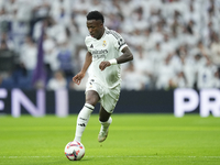 Vinicius Junior left winger of Real Madrid and Brazil in action during the La Liga match between Real Madrid CF and CA Osasuna at Estadio Sa...