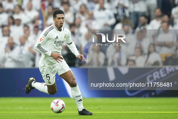 Jude Bellingham central midfield of Real Madrid and England in action during the La Liga match between Real Madrid CF and CA Osasuna at Esta...