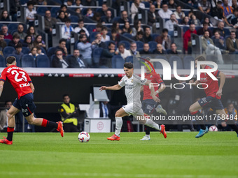 Brahim Diaz of Real Madrid CF (C) is in action with the ball during the La Liga EA Sports 2024/25 football match between Real Madrid CF and...