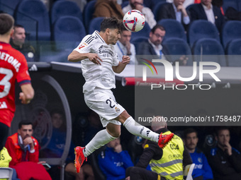 Brahim Diaz of Real Madrid CF heads the ball during the La Liga EA Sports 2024/25 football match between Real Madrid CF and CA Osasuna at Es...