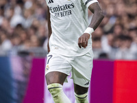 Vinicius Junior of Real Madrid CF is in action with the ball during the La Liga EA Sports 2024/25 football match between Real Madrid CF and...