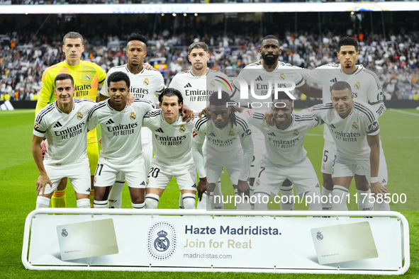 Real Madrid line up (L-R) Andriy Lunin, Eder Militao, Federico Valverde, Antonio Rudiger, Jude Bellingham, Lucas Vazquez, Rodrygo Goes, Fran...