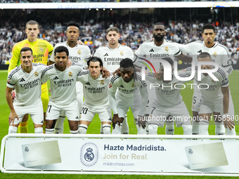 Real Madrid line up (L-R) Andriy Lunin, Eder Militao, Federico Valverde, Antonio Rudiger, Jude Bellingham, Lucas Vazquez, Rodrygo Goes, Fran...