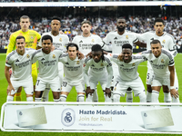 Real Madrid line up (L-R) Andriy Lunin, Eder Militao, Federico Valverde, Antonio Rudiger, Jude Bellingham, Lucas Vazquez, Rodrygo Goes, Fran...