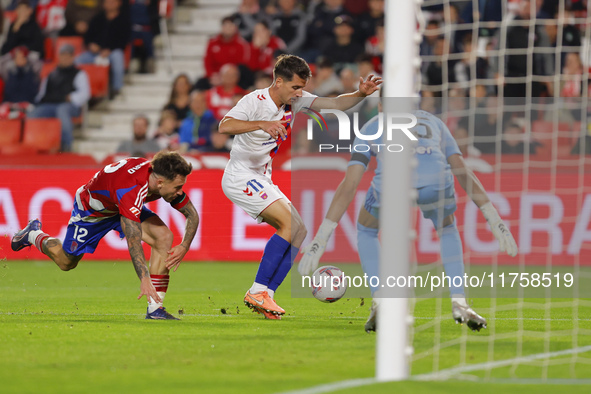 Ortuno of CD Eldense scores the second goal for his team during the LaLiga Hypermotion match between Granada CF and CD Eldense at Nuevo Los...