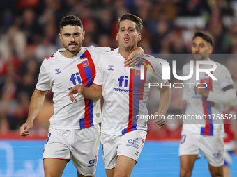 Ortuno of CD Eldense scores the second goal for his team during the LaLiga Hypermotion match between Granada CF and CD Eldense at Nuevo Los...