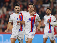 Ortuno of CD Eldense scores the second goal for his team during the LaLiga Hypermotion match between Granada CF and CD Eldense at Nuevo Los...