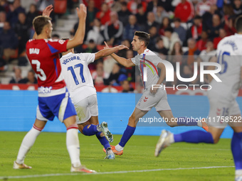 Ortuno of CD Eldense scores the second goal for his team during the LaLiga Hypermotion match between Granada CF and CD Eldense at Nuevo Los...