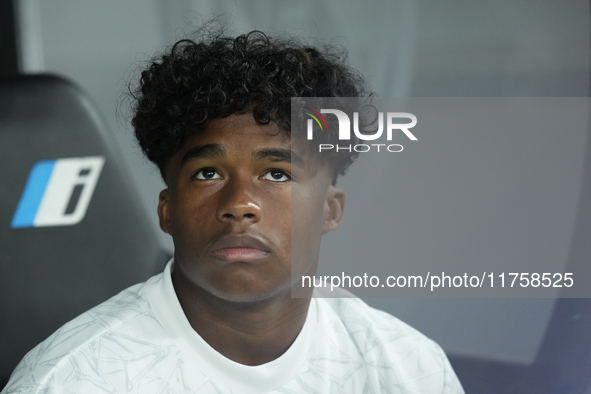 Endrick centre-forward of Real Madrid and Brazil sitting on the bench prior the La Liga match between Real Madrid CF and CA Osasuna at Estad...