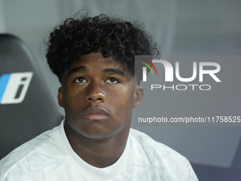 Endrick centre-forward of Real Madrid and Brazil sitting on the bench prior the La Liga match between Real Madrid CF and CA Osasuna at Estad...