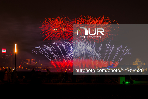 Fireworks illuminate the sky in Doha, Qatar, on November 9, 2024, on the last day of the inaugural Qatar Boat Show 2024 at Old Doha Port. Th...