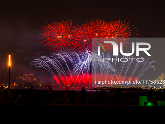 Fireworks illuminate the sky in Doha, Qatar, on November 9, 2024, on the last day of the inaugural Qatar Boat Show 2024 at Old Doha Port. Th...