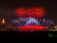 Fireworks illuminate the sky in Doha, Qatar, on November 9, 2024, on the last day of the inaugural Qatar Boat Show 2024 at Old Doha Port. Th...