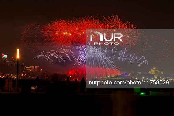 Fireworks illuminate the sky in Doha, Qatar, on November 9, 2024, on the last day of the inaugural Qatar Boat Show 2024 at Old Doha Port. Th...