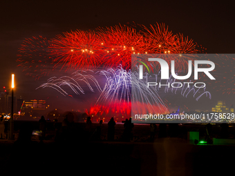 Fireworks illuminate the sky in Doha, Qatar, on November 9, 2024, on the last day of the inaugural Qatar Boat Show 2024 at Old Doha Port. Th...